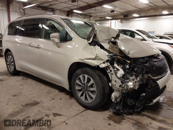 2021 Chrysler Pacifica Touring L with VIN 2C4RC1BG7MR531772, listed as a IAAI auction lot 41834392 with 156,123 mi miles and . Bid and sale history available at DreamBid. Image 1.