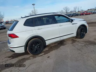 2023 Volkswagen Tiguan SE R-Line Black with VIN 3VV8B7AX9PM086225, listed as a IAAI auction lot 41276879 with Not provided miles and . Bid and sale history available at DreamBid. Image 4.
