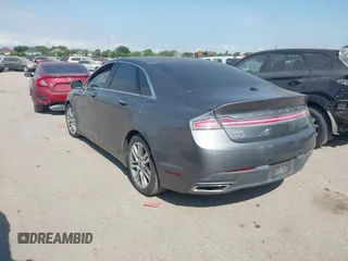 2014 Lincoln MKZ Hybrid z VIN 3LN6L2LU1ER831747, wystawiony jako IAAI lot #42053619 z przebiegiem 137 062 mil mil oraz . Historia ofert i sprzedaży dostępna na DreamBid. Obrazek 3.