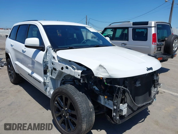 2018 Jeep Grand Cherokee Altitude with VIN 1C4RJEAG2JC404009, listed as a IAAI auction lot 42691304 with 60,948 mi miles and . Bid and sale history available at DreamBid. Image 6.