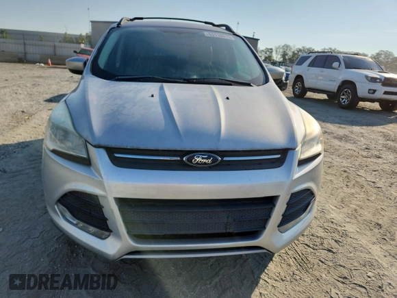 2013 Ford Escape SE z VIN 1FMCU9G92DUD07397, wystawiony jako Copart lot #63110315 z przebiegiem 167 296 mil mil oraz Czysty tytuł • Clean title. Historia ofert i sprzedaży dostępna na DreamBid. Obrazek 5.