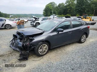 2018 Subaru Impreza Premium with VIN 4S3GTAD64J3715454, listed as a Copart auction lot 64798345 with 63,467 mi miles and Salvage title. Bid and sale history available at DreamBid. Image 1.