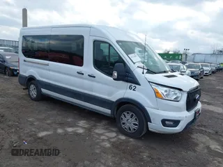 2021 Ford Transit Passenger XL with VIN 1FBAX2C82MKA32735, listed as a IAAI auction lot 41312892 with 62,053 mi miles and . Bid and sale history available at DreamBid. Image 1.