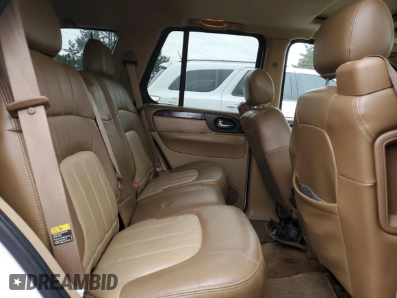 2003 GMC Envoy SLT with VIN 1GKDT13S332293112, listed as a Copart auction lot 43721225 with 139,471 mi miles and Salvage Title. Bid and sale history available at carsss.com. Image 12.