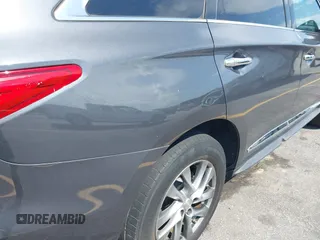 2014 Infiniti QX60 with VIN 5N1AL0MM6EC540477, listed as a IAAI auction lot 42791362 with 143,181 mi miles and . Bid and sale history available at DreamBid. Image 6.