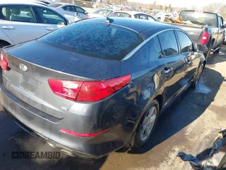 2015 Kia Optima LX with VIN KNAGM4A72F5543977, listed as a IAAI auction lot 41328035 with 153,805 mi miles and . Bid and sale history available at DreamBid. Image 4.
