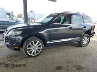 2010 Volkswagen Touareg VR6 with VIN WVGBF7A98AD001321, listed as a Copart auction lot 48949685 with 101,944 mi miles and Salvage Title. Bid and sale history available at DreamBid. Image 1.