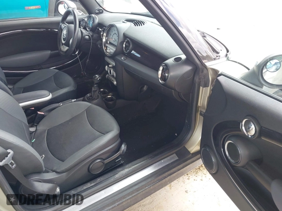 2010 MINI Convertible with VIN WMWMR3C52ATU97825, listed as a IAAI auction lot 42349417 with 64,045 mi miles and . Bid and sale history available at DreamBid. Image 5.