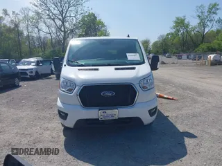 2021 Ford Transit Passenger XL z VIN 1FBAX2Y84MKA14973, wystawiony jako IAAI lot #42149017 z przebiegiem 105 171 mil mil oraz . Historia ofert i sprzedaży dostępna na DreamBid. Obrazek 13.