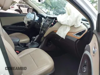 2014 Hyundai Santa Fe with VIN 5XYZU3LB9EG229255, listed as a IAAI auction lot 42407410 with 201,523 mi miles and . Bid and sale history available at DreamBid. Image 5.