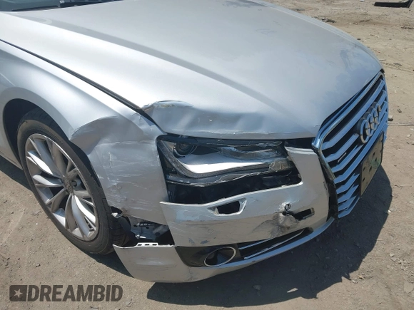 2011 Audi A8 with VIN WAURVAFD4BN019033, listed as a IAAI auction lot 42532173 with 97,486 mi miles and . Bid and sale history available at DreamBid. Image 6.