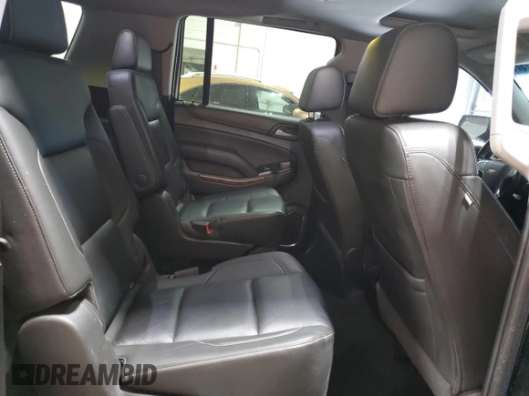 2018 Chevrolet Suburban LT z VIN 1GNSKHKC3JR228393, wystawiony jako Copart lot #56723575 z przebiegiem 149 932 mil mil oraz Czysty tytuł • Clean title. Historia ofert i sprzedaży dostępna na DreamBid. Obrazek 11.