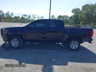 2021 Chevrolet Colorado 2WD LT z VIN 1GCGSCEN1M1131727, wystawiony jako IAAI lot #42181484 z przebiegiem 54 764 mil mil oraz . Historia ofert i sprzedaży dostępna na DreamBid. Obrazek 14.
