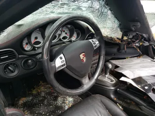 2008 Porsche 911 z VIN WP0CD29958S708310, wystawiony jako Copart lot #51357635 z przebiegiem Nie podano mil oraz Nie do naprawy • Non repairable. Historia ofert i sprzedaży dostępna na DreamBid. Obrazek 9.