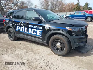 2020 Ford Police Interceptor Utility z VIN 1FM5K8AB2LGC51317, wystawiony jako IAAI lot #41755681 z przebiegiem 102 945 mil mil oraz . Historia ofert i sprzedaży dostępna na DreamBid. Obrazek 1.