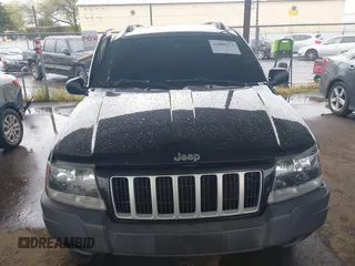 2004 Jeep Grand Cherokee Laredo z VIN 1J4GX48N94C435700, wystawiony jako IAAI lot #41809624 z przebiegiem 147 413 mil mil oraz . Historia ofert i sprzedaży dostępna na DreamBid. Obrazek 12.