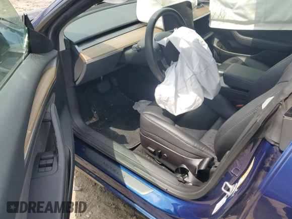 2023 Tesla Model 3 с VIN 5YJ3E1EA3PF426945, выставлен на аукционе Copart как лот 62584185 с пробегом Не указан миль и Списание • Salvage title. История ставок и продаж доступна на DreamBid. Изображение 8.