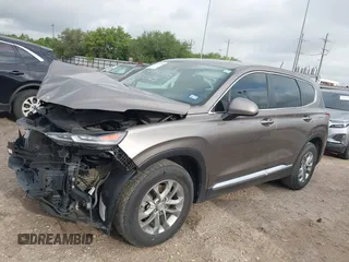2019 Hyundai Santa Fe SE z VIN 5NMS23AD2KH014037, wystawiony jako IAAI lot #42110778 z przebiegiem 48 975 mil mil oraz . Historia ofert i sprzedaży dostępna na DreamBid. Obrazek 2.