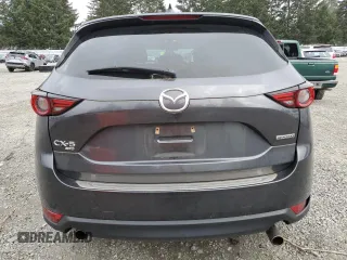 2020 Mazda CX-5 Grand Touring with VIN JM3KFBDM6L0815735, listed as a Copart auction lot 49511855 with 35,512 mi miles and Salvage Title. Bid and sale history available at carsss.com. Image 6.