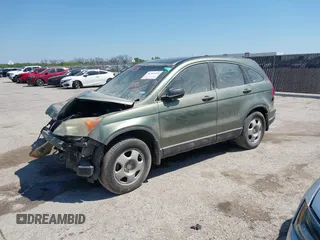 2009 Honda CR-V LX with VIN 5J6RE48399L029677, listed as a IAAI auction lot 38701558 with 136,294 mi miles. Bid and sale history available at carsss.com. Image 2.