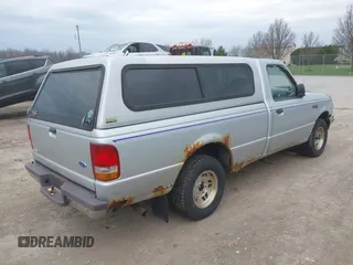1997 Ford Ranger XL with VIN 1FTCR10U8VPA00709, listed as a IAAI auction lot 42071941 with 153,501 mi miles. Bid and sale history available at carsss.com. Image 4.