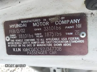 2002 Hyundai Accent GL with VIN KMHCG45C92U347708, listed as a IAAI auction lot 42137086 with 73,271 mi miles. Bid and sale history available at carsss.com. Image 9.