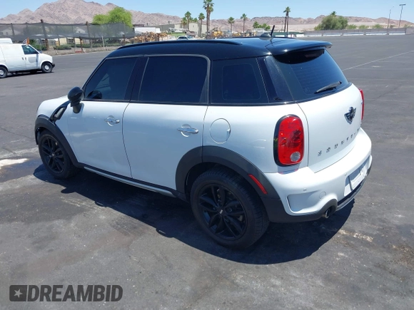 2015 MINI Countryman S with VIN WMWZC3C58FWT05613, listed as a IAAI auction lot 42374870 with 124,214 mi miles and . Bid and sale history available at DreamBid. Image 3.