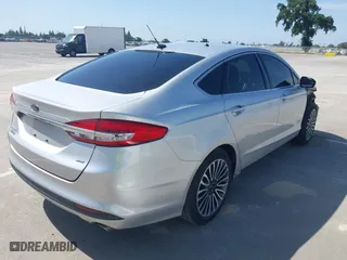 2017 Ford Fusion Energi SE with VIN 3FA6P0PU8HR242177, listed as a IAAI auction lot 42057898 with 119,435 mi miles. Bid and sale history available at carsss.com. Image 4.