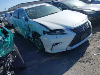 2016 Lexus ES 300h with VIN JTHBW1GG0G2101603, listed as a IAAI auction lot 41677725 with 148,182 mi miles and . Bid and sale history available at DreamBid. Image 1.