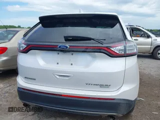 2017 Ford Edge Titanium z VIN 2FMPK3K98HBB28403, wystawiony jako IAAI lot #42103773 z przebiegiem 131 525 mil mil oraz . Historia ofert i sprzedaży dostępna na DreamBid. Obrazek 16.