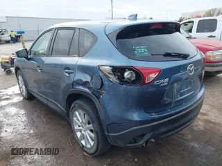 2014 Mazda CX-5 Grand Touring with VIN JM3KE4DYXE0403192, listed as a IAAI auction lot 41828016 with 156,270 mi miles and . Bid and sale history available at carsss.com. Image 3.