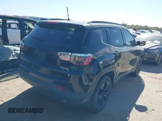 2018 Jeep Compass Latitude with VIN 3C4NJCBB6JT407411, listed as a IAAI auction lot 41851132 with 123,431 mi miles and . Bid and sale history available at DreamBid. Image 4.