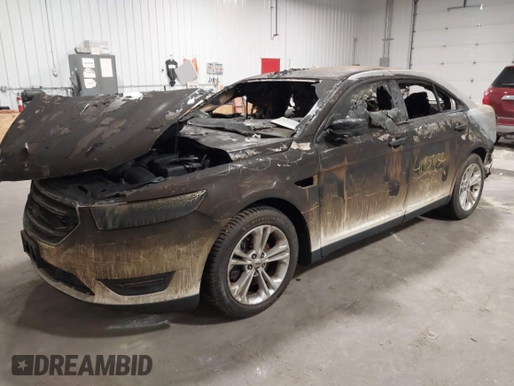 2014 Ford Taurus SEL with VIN 1FAHP2E81EG136022, listed as a IAAI auction lot 41937132 with 76,285 mi miles and . Bid and sale history available at DreamBid. Image 2.