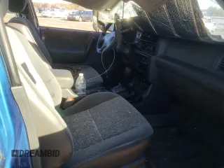 2001 Isuzu Rodeo S with VIN 4S2DM58WX14301336, listed as a Copart auction lot 77770164 with Not provided miles and Salvage title. Bid and sale history available at DreamBid. Image 7.