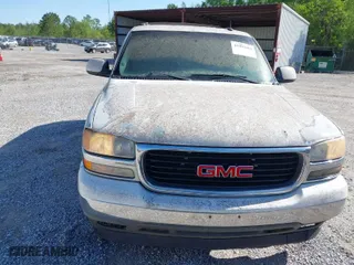 2005 GMC Yukon SLT with VIN 1GKEC13T15J147023, listed as a IAAI auction lot 41993666 with 250,216 mi miles. Bid and sale history available at carsss.com. Image 6.