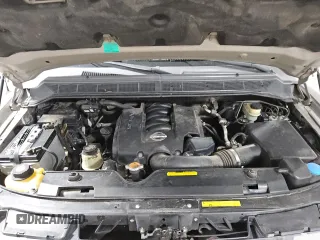 2006 Nissan Titan LE z VIN 1N6AA07BX6N573134, wystawiony jako Copart lot #46487815 z przebiegiem 161 174 mil mil oraz Czysty tytuł • Clean title. Historia ofert i sprzedaży dostępna na DreamBid. Obrazek 11.