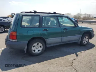 1999 Subaru Forester L with VIN JF1SF6350XG745369, listed as a Copart auction lot 64697045 with 42,522 mi miles and Clean title. Bid and sale history available at DreamBid. Image 3.