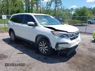 2019 Honda Pilot EX-L with VIN 5FNYF5H42KB026108, listed as a IAAI auction lot 42387593 with 112,556 mi miles and . Bid and sale history available at DreamBid. Image 1.