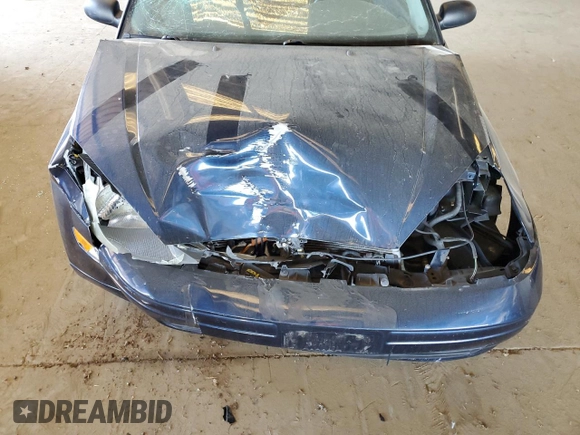 2004 Ford Focus ZX3 with VIN 3FAFP31Z44R127138, listed as a Copart auction lot 48397275 with 129,873 mi miles and Salvage title. Bid and sale history available at DreamBid. Image 11.