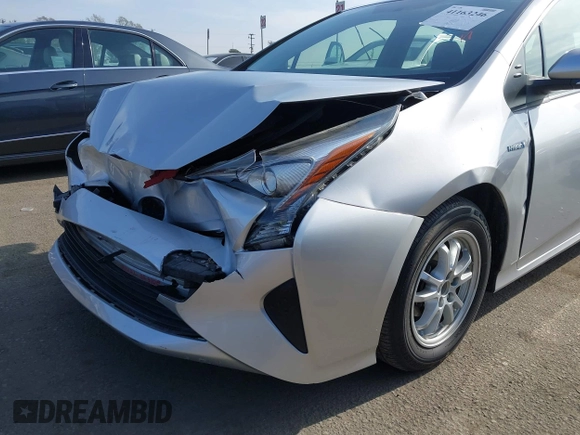 2016 Toyota Prius Two z VIN JTDKBRFU1G3016850, wystawiony jako IAAI lot #41163246 z przebiegiem 68 858 mil mil oraz . Historia ofert i sprzedaży dostępna na DreamBid. Obrazek 6.