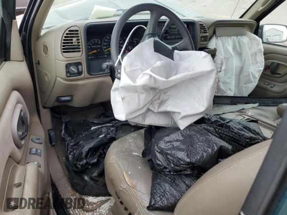 1998 Chevrolet Tahoe z VIN 3GNEK18R4WG128424, wystawiony jako Copart lot #79684984 z przebiegiem 217 456 mil mil oraz Szkoda całkowita • Salvage title. Historia ofert i sprzedaży dostępna na DreamBid. Obrazek 8.