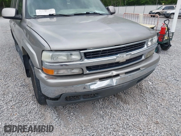 2003 Chevrolet Suburban LT z VIN 1GNEC16Z13J140136, wystawiony jako IAAI lot #42142827 z przebiegiem 252 698 mil mil oraz . Historia ofert i sprzedaży dostępna na DreamBid. Obrazek 6.