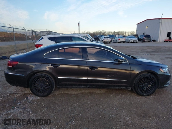 2015 Volkswagen CC Lux with VIN WVWRP7AN9FE819154, listed as a IAAI auction lot 41669832 with 151,142 mi miles. Bid and sale history available at carsss.com. Image 13.