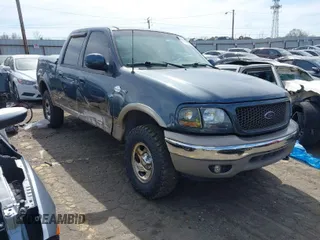 2003 Ford F-150 XLT with VIN 1FTRW08L33KB05743, listed as a IAAI auction lot 41828979 with 117,345 mi miles. Bid and sale history available at carsss.com. Image 1.