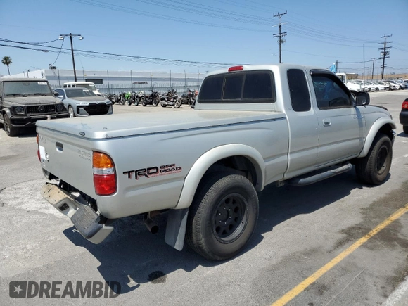 2002 Toyota Tacoma PreRunner z VIN 5TESN92N92Z898141, wystawiony jako Copart lot #59223475 z przebiegiem 117 152 mil mil oraz Szkoda całkowita • Salvage title. Historia ofert i sprzedaży dostępna na DreamBid. Obrazek 3.