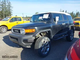 2008 Toyota FJ Cruiser with VIN JTEBU11F780104062, listed as a IAAI auction lot 41010076 with 220,975 mi miles. Bid and sale history available at carsss.com. Image 2.