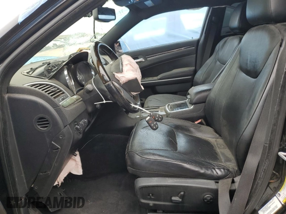 2012 Chrysler 300 with VIN 2C3CCAET3CH256182, listed as a Copart auction lot 52744035 with 153,490 mi miles and Salvage Title. Bid and sale history available at carsss.com. Image 7.