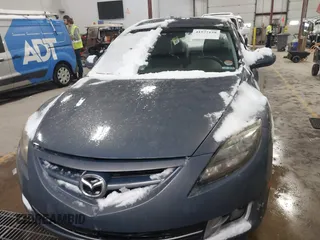 2009 Mazda 6 i Touring with VIN 1YVHP82A495M38694, listed as a IAAI auction lot 41577128 with 230,557 mi miles and . Bid and sale history available at carsss.com. Image 12.