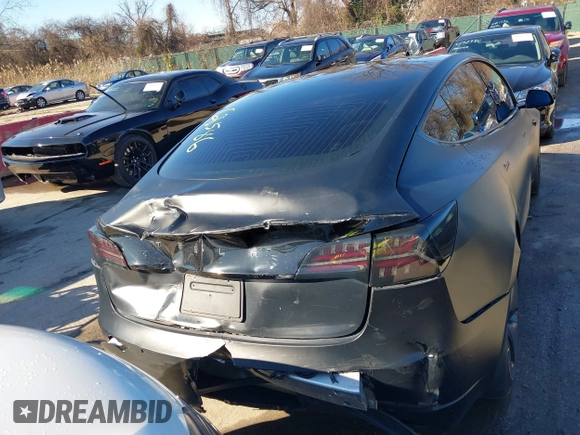 2020 Tesla Model 3 Standard Range Plus with VIN 5YJ3E1EA4LF745491, listed as a IAAI auction lot 41186726 with 74,575 mi miles and . Bid and sale history available at DreamBid. Image 6.