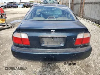 1997 Honda Accord EX with VIN 1HGCD5668VA262569, listed as a Copart auction lot 44713835 with 261,346 mi miles and Salvage Title. Bid and sale history available at DreamBid. Image 6.